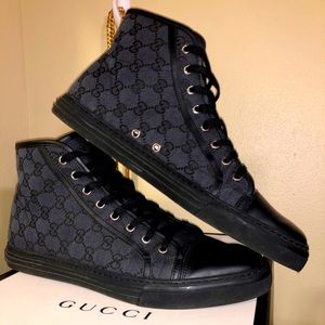 Gucci men’s black hightop shoes